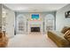 Cozy sitting room with a fireplace, chaise lounge, and natural light at 1562 Asheforde Dr, Marietta, GA 30068