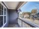 Balcony with views of the neighborhood and nearby trees and shrubbery at 2359 Castle Keep Way, Atlanta, GA 30316