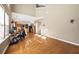 Bright living room with a fireplace, tall ceilings, lots of natural light, and an open-concept kitchen at 3940 Medlock Park Dr, Snellville, GA 30039