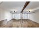 Spacious two car garage with concrete floors and two separate white garage doors and overhead openers at 5307 Mountain Village Ct, Stone Mountain, GA 30083