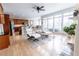 Bright open concept featuring living room, kitchen and dining with hardwood floors at 5347 Harbury Cv, Suwanee, GA 30024