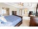 A main bedroom features doorways leading to a bathroom, an office, and a sitting room at 5347 Harbury Cv, Suwanee, GA 30024