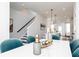 Dining area showcasing modern decor and seamless transition to the kitchen at 335 Skylar Se Way, Atlanta, GA 30315