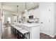 Open kitchen view of island and stainless appliances at 335 Skylar Se Way, Atlanta, GA 30315