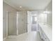 This bathroom features a shower, double sinks, and vanity at 5611 Manassas Run, Stone Mountain, GA 30087
