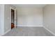 Neutral bedroom with carpeted flooring and closet at 5611 Manassas Run, Stone Mountain, GA 30087