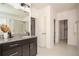 Spacious bathroom featuring a double vanity and access to the shower and toilet at 1977 Boyd Trace Nw Ln, Atlanta, GA 30318