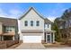 Charming two-story home with a two-car garage and a screened in porch at 1977 Boyd Trace Nw Ln, Atlanta, GA 30318