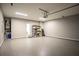 Epoxy floor in spacious two car garage with storage shelves and opener at 1977 Boyd Trace Nw Ln, Atlanta, GA 30318