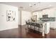 Modern kitchen with granite countertops, stainless steel appliances, and a gray backsplash at 1977 Boyd Trace Nw Ln, Atlanta, GA 30318
