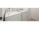 A laundry room featuring a washing machine and a dryer at 1977 Boyd Trace Nw Ln, Atlanta, GA 30318