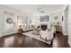 Bright living room boasts hardwood floors, modern fireplace, stylish furniture, and plenty of natural light at 1977 Boyd Trace Nw Ln, Atlanta, GA 30318