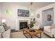 Stylish living room with fireplace and modern decor, creating a comfortable and inviting space at 1977 Boyd Trace Nw Ln, Atlanta, GA 30318