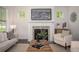 Modern living room with fireplace and contemporary decor, bathed in natural light, creates a cozy atmosphere at 1977 Boyd Trace Nw Ln, Atlanta, GA 30318
