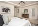 Bright main bedroom featuring a ceiling fan and an ensuite bathroom at 1977 Boyd Trace Nw Ln, Atlanta, GA 30318