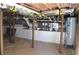 Exposed basement with unfinished flooring, supports, and mechanicals at 387 S Howard Se St, Atlanta, GA 30317