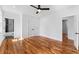 Bright bedroom with hardwood floors and ensuite bath, offering a comfortable and private space at 387 S Howard Se St, Atlanta, GA 30317