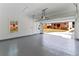 Clean, spacious garage with epoxy flooring and view of the backyard and home at 387 S Howard Se St, Atlanta, GA 30317