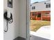 View of backyard from garage showing EV charger and modern two-story home at 387 S Howard Se St, Atlanta, GA 30317