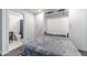This bedroom features a built-in murphy bed and a view into the en-suite bathroom at 2164 Mill Garden Run, Buford, GA 30519