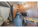 Cozy home office features wood paneled walls, modern lighting, and gaming set up at 2164 Mill Garden Run, Buford, GA 30519