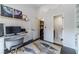 Office with built in features, view of the bathroom and laundry room, and an integrated desk at 2164 Mill Garden Run, Buford, GA 30519