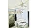 Bathroom featuring a corner tub, a glass shower, and a bright skylight at 3810 Galloway Dr, Roswell, GA 30075