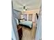 Bright bedroom with a ceiling fan, wood floors, and gray doors for a modern aesthetic at 3810 Galloway Dr, Roswell, GA 30075