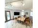 Modern conference room with a large, unique table, comfortable seating, and ample lighting for professional meetings at 3810 Galloway Dr, Roswell, GA 30075