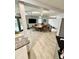 Spacious gathering space with a long table and comfortable chairs, enhanced by natural light and ample room to gather at 3810 Galloway Dr, Roswell, GA 30075