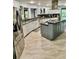 Spacious kitchen featuring modern stainless steel appliances and a center island at 3810 Galloway Dr, Roswell, GA 30075