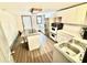 Bright kitchen with stainless steel appliances, granite countertops, and a breakfast bar at 3810 Galloway Dr, Roswell, GA 30075