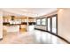 Open concept kitchen with ample cabinets, island, and a view of the outdoor deck at 3810 Galloway Dr, Roswell, GA 30075