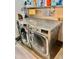 Laundry room featuring modern, front-load stainless steel washer and dryer at 3810 Galloway Dr, Roswell, GA 30075
