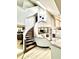 Unique staircase leads to different levels with views of the kitchen and living spaces at 3810 Galloway Dr, Roswell, GA 30075