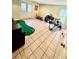 Finished basement with putting green and fitness equipment at 4722 Bradford Ln, Powder Springs, GA 30127
