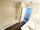 Bathroom featuring a shower, single vanity and modern fixtures at 4722 Bradford Ln, Powder Springs, GA 30127