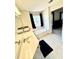 Bathroom featuring large soaking tub and vanity with large mirror at 4722 Bradford Ln, Powder Springs, GA 30127