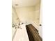 This well-maintained bathroom features wood-look floors, bright vanity and a bathtub-shower at 4722 Bradford Ln, Powder Springs, GA 30127