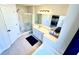 Bathroom featuring a glass enclosed shower and soaking tub at 4722 Bradford Ln, Powder Springs, GA 30127