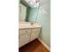 Bright bathroom with white sink cabinet at 4722 Bradford Ln, Powder Springs, GA 30127