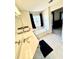 Well-lit bathroom with a tub, vanity, and modern fixtures at 4722 Bradford Ln, Powder Springs, GA 30127