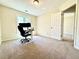 Bedroom showing a workspace, carpet flooring, and neutral paint at 4722 Bradford Ln, Powder Springs, GA 30127