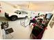 View of a garage featuring storage shelves and car parking at 4722 Bradford Ln, Powder Springs, GA 30127