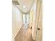 Carpeted hallway leading to other rooms, showcasing neutral wall paint at 4722 Bradford Ln, Powder Springs, GA 30127