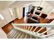 Cozy living room with fireplace, hardwood floors, and lots of natural light from the many windows at 4722 Bradford Ln, Powder Springs, GA 30127
