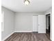 Empty bedroom with a window and a double door closet at 5848 Dunn Sw Rd, Mableton, GA 30126