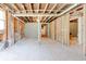 Spacious unfinished basement with visible beams and studs, and concrete flooring ready for customization at 955 Bouldercrest Se Dr, Atlanta, GA 30316