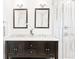 Bathroom features a double vanity, a tile backsplash, and a glass walk-in shower at 955 Bouldercrest Se Dr, Atlanta, GA 30316