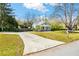 Charming craftsman home with a welcoming front porch, mature trees, and a long driveway at 955 Bouldercrest Se Dr, Atlanta, GA 30316